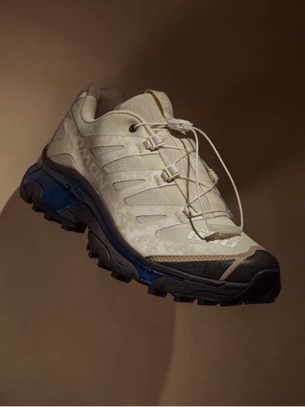 Woman’s Salomon XT-4 vanilla coffee shoes